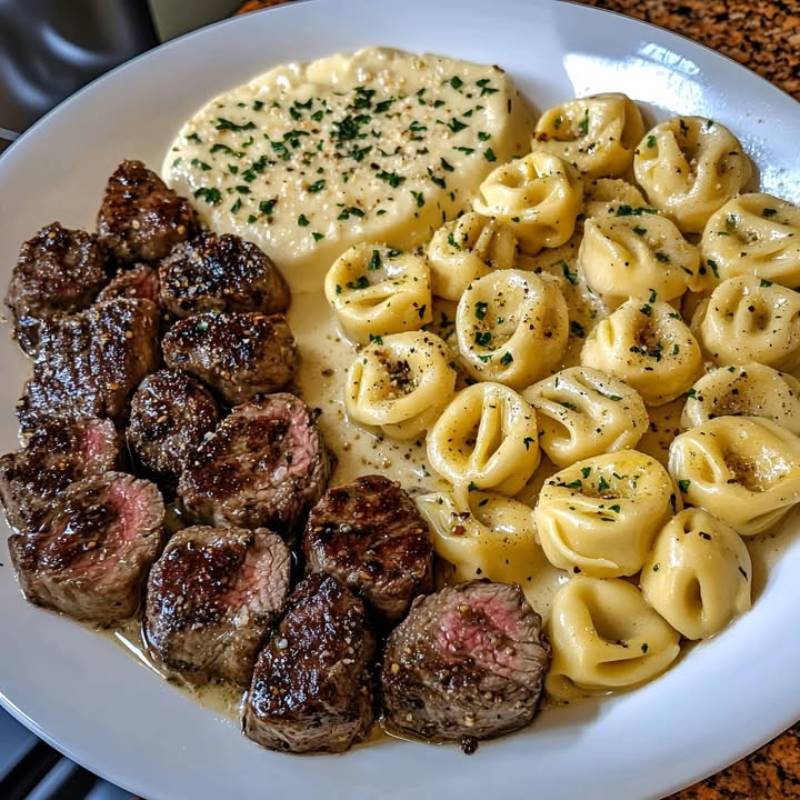 Three-Cheese Tortellini Alfredo with Sautéed Garlic Steak Bites